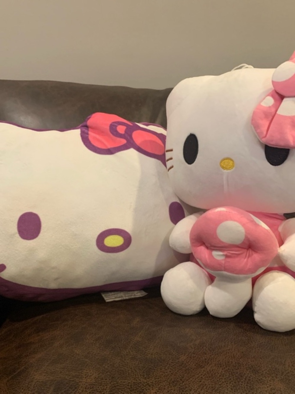 2 for $13.  Hello Kitty 
White and Pink Plush Set